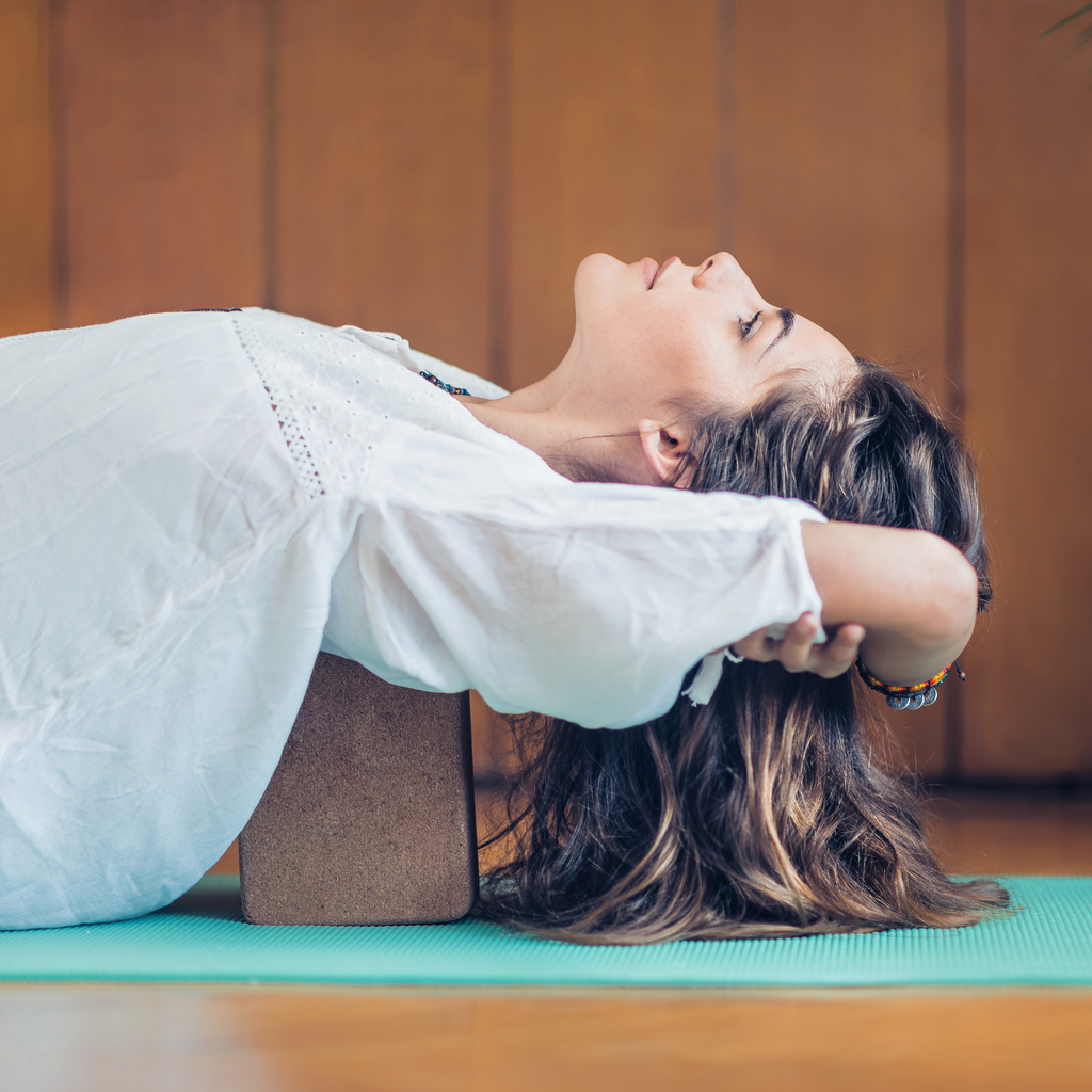 Haal meer uit je yoga oefeningen met behulp van een yogablok